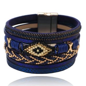 Blauwe dames armband met kristal en goudkleurige details