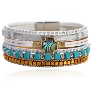 Deja Boho Armband goudkleurig met turquoise kralen en kruis natuursteen in wit