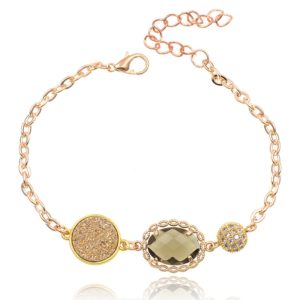Goudkleurige verstelbare dames armband met groen glassteen